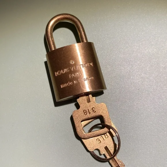 Authentic Louis Vuitton Lock - Picture 2 of 2